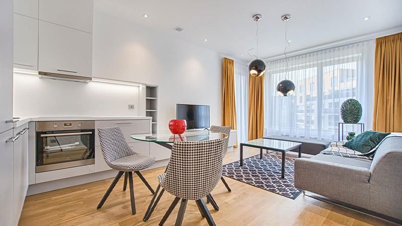 two chairs with glass table on living room